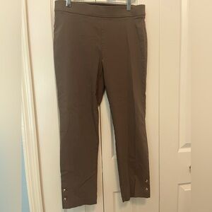 Tan pull on capri pants with gold ankle buttons. Size M